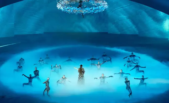 Artists performs during the closing ceremony of the 2026 Winter Olympics, in Verona, Italy, Sunday, Feb. 22, 2026. (AP Photo/Bernat Armangue)