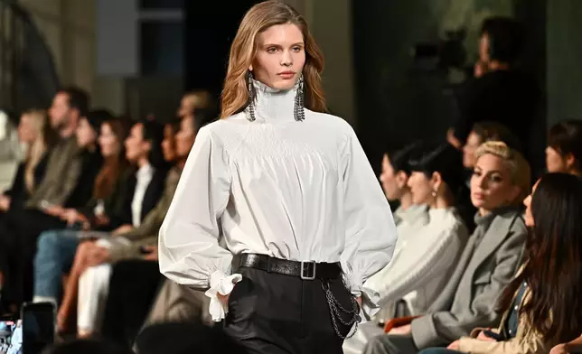 A model walks the runway during the Ralph Lauren Fall/Winter 2026 fashion show as part of New York Fashion Week, Tuesday, Feb. 10, 2026, in New York. (Photo by Evan Agostini/Invision/AP)