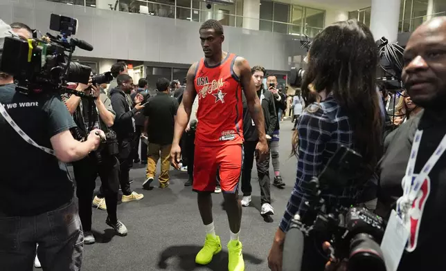 Detroit Pistons' Jalen Duren arrives at the NBA All-Star basketball game media day Saturday, Feb. 14, 2026, in Inglewood, Calif. (AP Photo/Jae C. Hong)