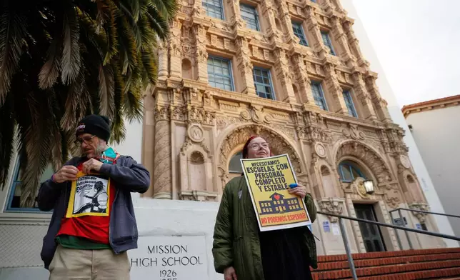 Teachers picket in front of Mission High School in San Francisco on Monday, Feb. 9, 2026. (Brontë Wittpenn/San Francisco Chronicle via AP)