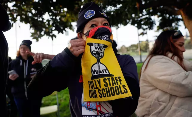 Teachers picket in front of Mission High School in San Francisco on Monday, Feb. 9, 2026. (Brontë Wittpenn/San Francisco Chronicle via AP)