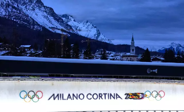 Germany's Anna Berreiter slides down the track during a women's single luge run at the 2026 Winter Olympics, in Cortina d'Ampezzo, Italy, Monday, Feb. 9, 2026. (AP Photo/Alessandra Tarantino)