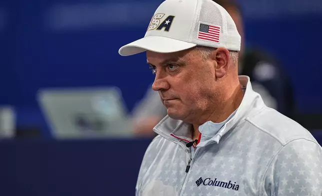 United States' Rich Ruohonen watches the men's curling round robin session against Canada, at the 2026 Winter Olympics, in Cortina d'Ampezzo, Italy, Friday, Feb. 13, 2026. (AP Photo/Fatima Shbair)