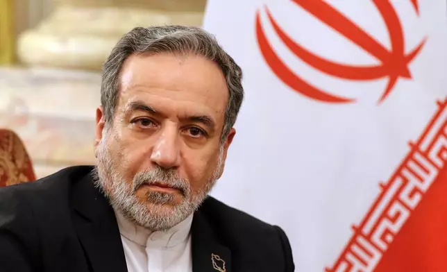 FILE - Iranian Foreign Minister Abbas Araghchi looks on during a meeting with Director General of the International Atomic Energy Agency (IAEA) Rafael Grossi, and Egyptian Foreign Minister Badr Abdelatty, at Tahrir Palace in Cairo, Tuesday, Sept. 9, 2025. (AP Photo/Khaled Elfiqi, File)