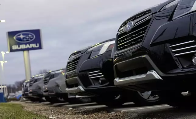 Subarus sit parked at a dealership on the Bedford Auto Mile in Bedford, Ohio, Friday, Feb. 20, 2026. (AP Photo/Sue Ogrocki)