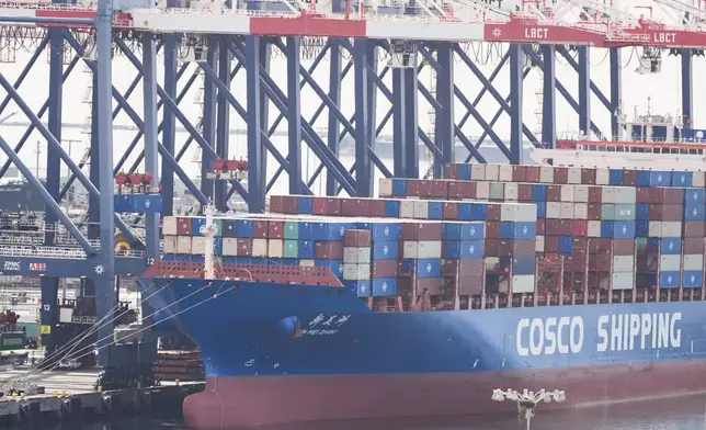 A ship is docked at the Port of Long Beach Friday, Feb. 20, 2026, in Long Beach, Calif. (AP Photo/Damian Dovarganes)