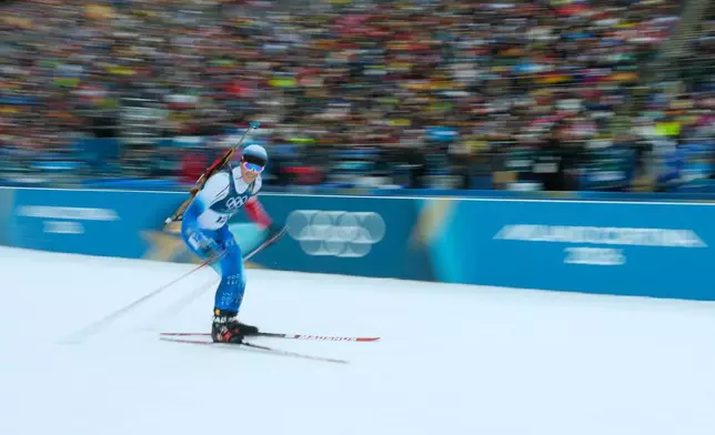 Sondre Slettemark, of Denmark, competes in the men's 20-kilometer individual biathlon race at the 2026 Winter Olympics in Anterselva, Italy, Tuesday, Feb. 10, 2026. (AP Photo/Mosa'ab Elshamy)