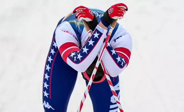 Julia Kern, of the United States reacts after crossing the finish line in a semifinal of the cross-country skiing women's sprint classic at the 2026 Winter Olympics, in Tesero, Italy, Tuesday, Feb. 10, 2026. (AP Photo/Matthias Schrader)
