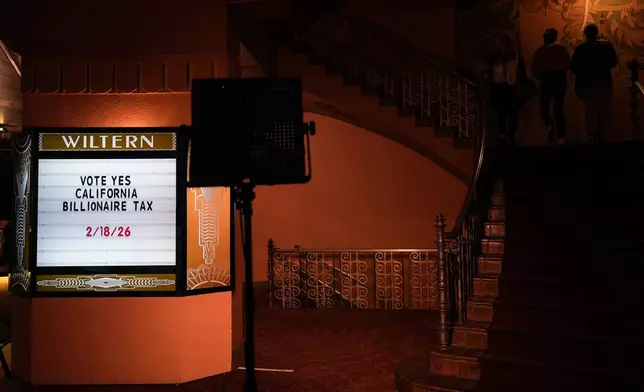 A message is displayed on a letter board at a campaign event for a proposed "billionaires tax" in Los Angeles, Wednesday, Feb. 18, 2026. (AP Photo/Jae C. Hong)