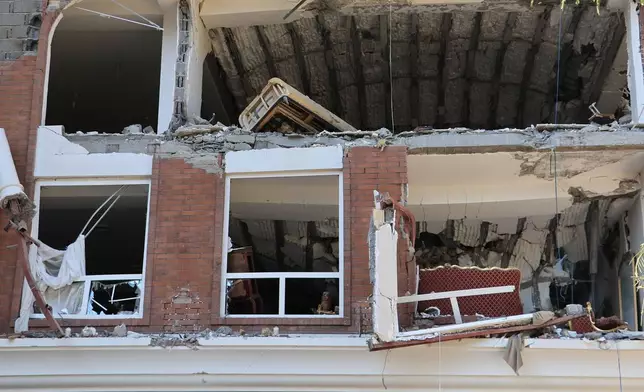 An apartment building is seen after an explosion in the southern port city of Bandar Abbas, Iran, on Saturday, Jan. 31, 2026. (Amirhosein Khorgooi/ISNA via AP)