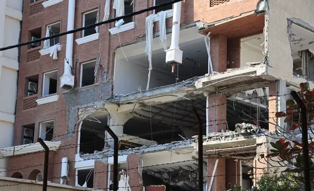 An apartment building is seen after an explosion in the southern port city of Bandar Abbas, Iran, on Saturday, Jan. 31, 2026. (Amirhosein Khorgooi/ISNA via AP)