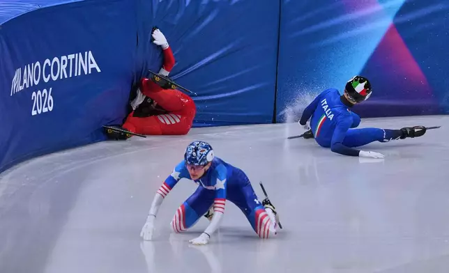 Kamila Sellier of Poland falls during a short track speed skating women's 1500 meters quarterfinal at the 2026 Winter Olympics, in Milan, Italy, Friday, Feb. 20, 2026. (AP Photo/Stephanie Scarbrough)