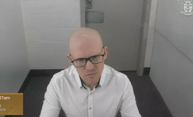 In this photo made from video and provided by the New Zealand Court of Appeal, Monday, Feb. 9, 2026, Brenton Tarrant appears before the court by video from Auckland Prison in Auckland. (New Zealand Court of Appeal via AP)
