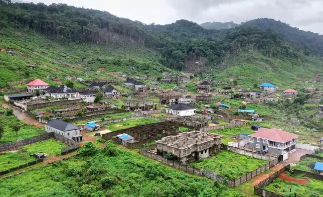 An aerial view of mansions under construction in Bio Barray, outskirt of Freetown, Sierra Leone, Wednesday, July 2, 2025. (AP Photo/Misper Apawu)