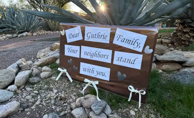 /// Neighbors of Nancy Guthrie, the daughter of "Today" host Savannah Guthrie, show support for the family in metro Tucson, Ariz., on Tuesday, Feb. 3, 2026, as the search continues to find Nancy who was reported missing. (AP Photo/Sejal Govindarao)