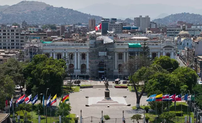 The Congress building stands the day before lawmakers debate the removal of the nation's president in Lima, Peru, Monday, Feb. 16, 2026. (AP Photo/Guadalupe Pardo)