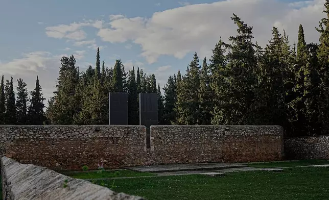 The execution wall at the Kaisariani Shooting Range in the Kaisariani suburb of Athens, Monday, Feb. 16, 2026, where 200 Greek communist political prisoners were executed by Nazi forces on May 1, 1944. (AP Photo/Petros Giannakouris)