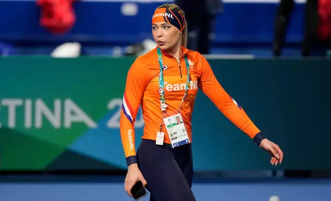 Jutta Leerdam of the Netherlands walks inside the venue ahead of the women's 3,000 meters speedskating race at the 2026 Winter Olympics, in Milan, Italy, Saturday, Feb. 7, 2026. (AP Photo/Luca Bruno)