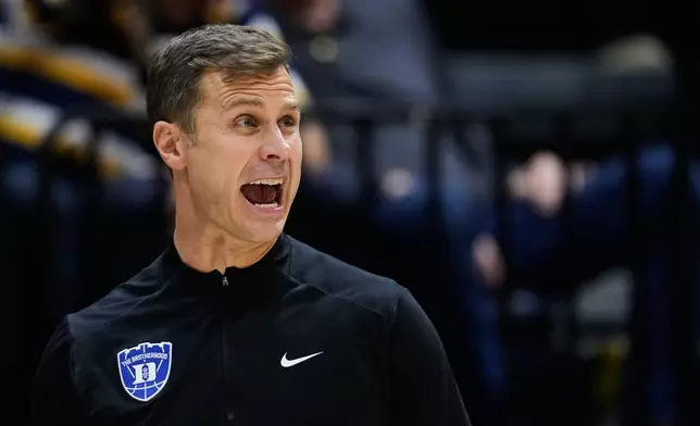 FILE - Duke head coach Jon Scheyer reacts during the first half of an NCAA college basketball game against California, Wednesday, Jan. 14, 2026, in Berkeley, Calif. (AP Photo/Godofredo A. Vásquez, File)