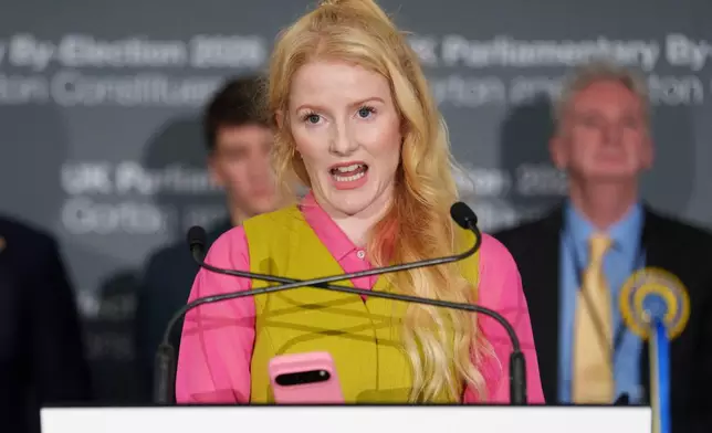 The Green Party candidate Hannah Spencer speaks after winning the Gorton and Denton by-election, Manchester, England, Friday, Feb. 27, 2026. (AP Photo/Jon Super)