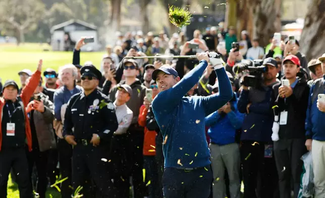 Rory McIlroy, from Northern Ireland, hits from a fairway rough on the eighth hole during the first round of the Genesis Invitational golf tournament at Riviera Country Club, Thursday, Feb. 19, 2026, in the Pacific Palisades area of Los Angeles. (AP Photo/Caroline Brehman)