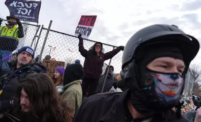 Counterprotesters demonstrate against Jake Lang on Saturday, Feb. 7, 2026, in Minneapolis. (AP Photo/Ryan Murphy)