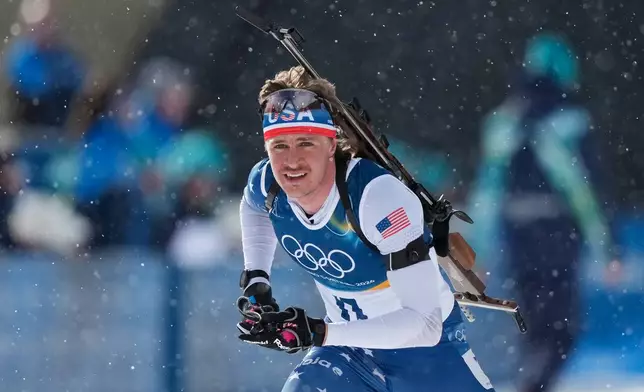 Campbell Wright, of the United States, competes in the men's 15-kilometer mass start biathlon race at the 2026 Winter Olympics in Anterselva, Italy, Friday, Feb. 20, 2026. (AP Photo/Mosa'ab Elshamy)