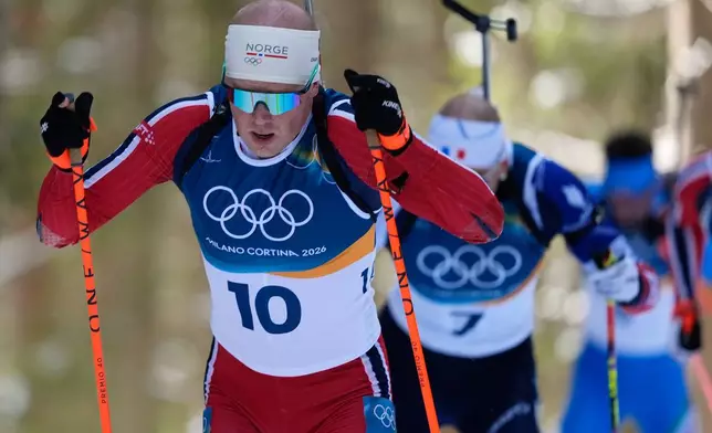 Johannes Dale-Skjevdal, of Norway, competes in the men's 15-kilometer mass start biathlon race at the 2026 Winter Olympics in Anterselva, Italy, Friday, Feb. 20, 2026. (AP Photo/Andrew Medichini)