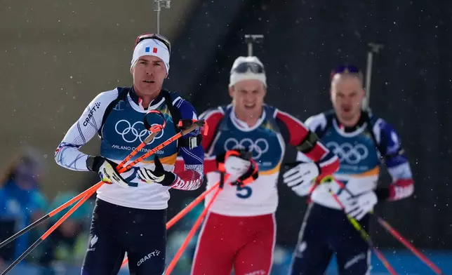 Quentin Fillon Maillet, of France, competes in the men's 15-kilometer mass start biathlon race at the 2026 Winter Olympics in Anterselva, Italy, Friday, Feb. 20, 2026. (AP Photo/Mosa'ab Elshamy)