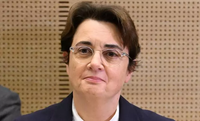 FILE - Laurence des Cars, director of Le Louvre museum, poses before a hearing at the Culture commission of the Senate, three days after historic jewels were stolen in a daring daylight heist, Oct. 22, 2025 in Paris. (AP Photo/Emma Da Silva, File)