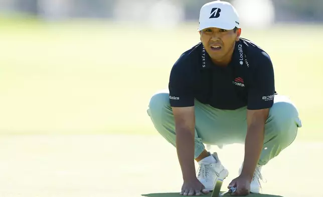Kurt Kitayama measures his putt on the 17th green during the final round of the Genesis Invitational golf tournament at Riviera Country Club, Sunday, Feb. 22, 2026, in the Pacific Palisades area of Los Angeles. (AP Photo/Caroline Brehman )