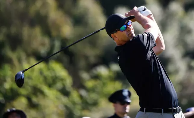 Adam Scott, from Australia, hits from the second tee during the final round of the Genesis Invitational golf tournament at Riviera Country Club, Sunday, Feb. 22, 2026, in the Pacific Palisades area of Los Angeles. (AP Photo/Caroline Brehman )
