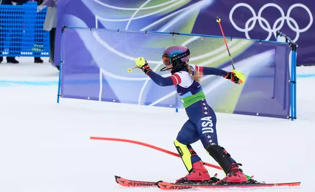 United States' Mikaela Shiffrin at the finish area during an alpine ski, slalom portion of a women's team combined race, at the 2026 Winter Olympics, in Cortina d'Ampezzo, Italy, Tuesday, Feb. 10, 2026. (AP Photo/Robert F. Bukaty)