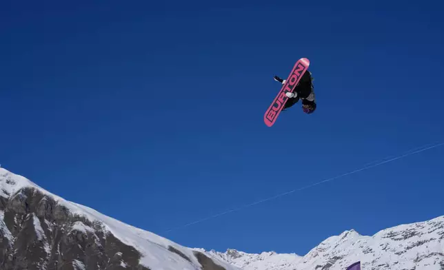 Austria's Anna Gasser competes during the women's snowboarding slopestyle qualifications at the 2026 Winter Olympics, in Livigno, Italy, Sunday, Feb. 15, 2026. (AP Photo/Julia Demaree Nikhinson)