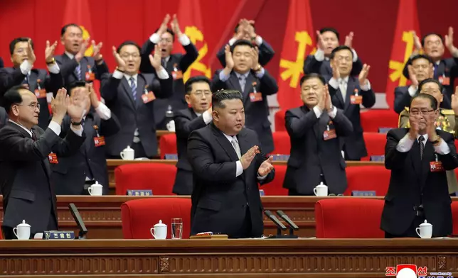 This photo provided Monday, Feb. 23, 2026, by the North Korean government, its leader Kim Jong Un, center, claps hands as he was re-elected to the top post of the ruling Workers’ Party, during the party's Congress in Pyongyang, Sunday, Feb. 22, 2026. Independent journalists were not given access to cover the event depicted in this image distributed by the North Korean government. The content of this image is as provided and cannot be independently verified. Korean language watermark on image as provided by source reads: "KCNA" which is the abbreviation for Korean Central News Agency. (Korean Central News Agency/Korea News Service via AP)