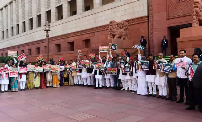 Members of the opposition stage a protest against the India-US trade deal outside the Parliament in New Delhi, India, Thursday, Feb. 12, 2026. (AP Photo)