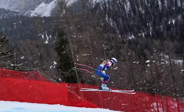 United States' Lindsey Vonn races in an alpine ski women's downhill training, at the 2026 Winter Olympics, in Cortina d'Ampezzo, Italy, Saturday, Feb. 7, 2026. (AP Photo/Jacquelyn Martin)