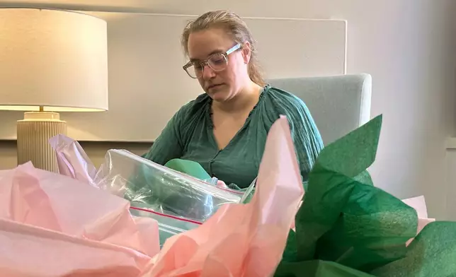 Joelle Haley crochets at the Children's Hospital of Michigan Neonatal Intensive Care Unit at DMC Hutzel Women's Hospital in Detroit, Thursday, Feb. 26, 2026. (AP Photo/Corey Williams)