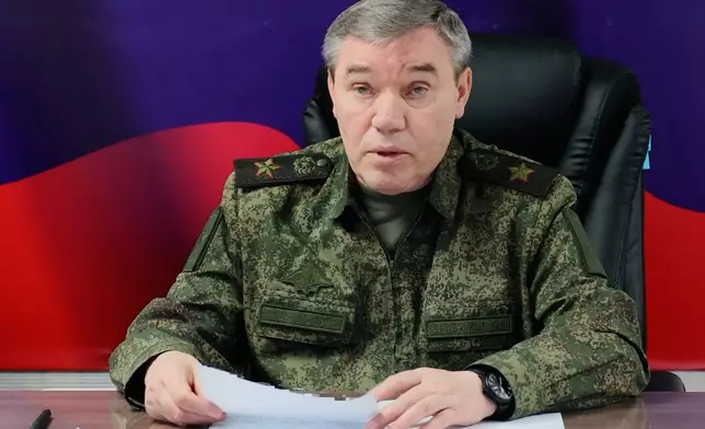 In this image made from video provided by Russian Defense Ministry Press Service on Saturday, Feb. 14, 2026, Russian Chief of General Staff Gen. Valery Gerasimov speaks while inspecting the troops involved in the fighting in Ukraine. (Russian Defense Ministry Press Service via AP)