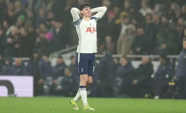 Tottenham's Archie Gray reacts after scoring during the English Premier League soccer match between Tottenham and Newcastle in London, Tuesday, Feb. 10, 2026. (AP Photo/Ian Walton)