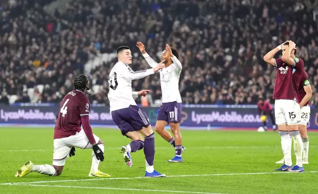 Manchester United's Benjamin Sesko (30) reacts after scoring against West Ham United during a Premier League soccer match, Tuesday, Feb. 10, 2026, in London. (Adam Davy/PA via AP)