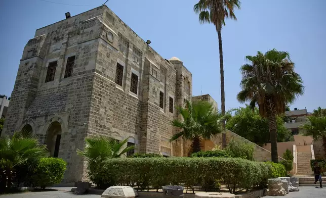 FILE – Archaeological columns are displayed outside the Pasha Palace, a museum housing artifacts that was later damaged in the Israel-Hamas war, in Gaza City, Tuesday, July 16, 2019. (AP Photo/Khalil Hamra, File)