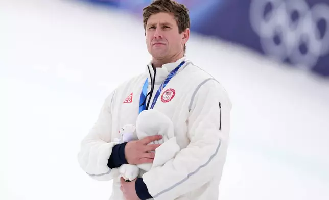 Silver medal's winner United States' Ryan Cochran Siegle attends the podium ceremony for a men's super-G race, at the 2026 Winter Olympics, in Bormio, Italy, Wednesday, Feb.11, 2026. (AP Photo/Julia Demaree Nikhinson)