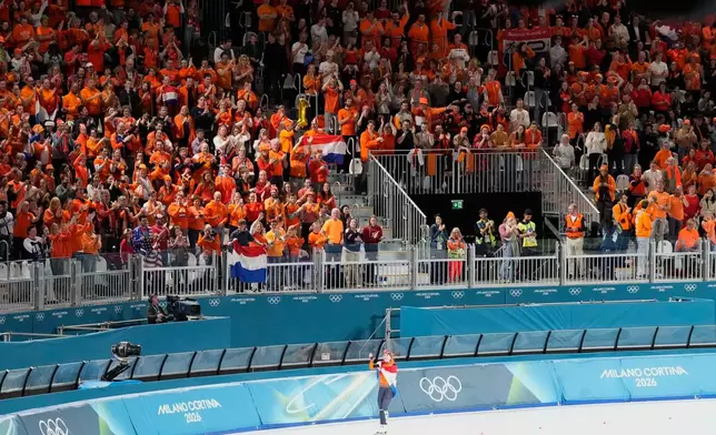 Netherlands' Antoinette Rijpma-de Jong celebrates after winning the women's speedskating 1,500-meters final at the 2026 Winter Olympics, in Milan, Italy, Friday, Feb. 20, 2026. (AP Photo/David J. Phillip)
