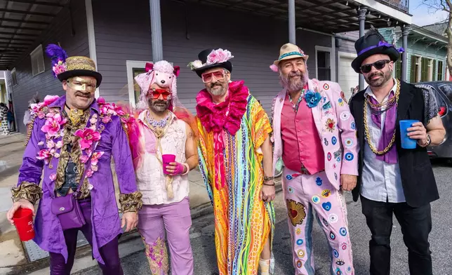 Attendees march during the annual Society of Saint Anne parade on Mardi Gras Day, Tuesday, Feb. 17, 2026, in New Orleans. (Photo by Amy Harris/Invision/AP)