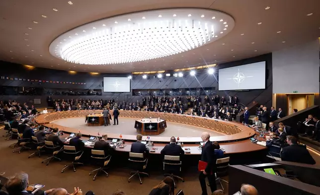 A general view of the round table during a meeting of the North Atlantic Council in Defense Ministers Session at NATO headquarters in Brussels, Thursday, Feb. 12, 2026. (AP Photo/Geert Vanden Wijngaert)