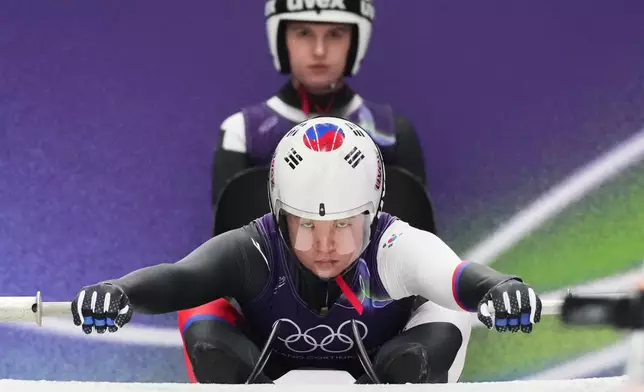 South Korea's Jung Hyesun starts for a women's Luge training session at the 2026 Winter Olympics, in Cortina d'Ampezzo, Italy, Thursday, Feb. 5, 2026. (AP Photo/Alessandra Tarantino)