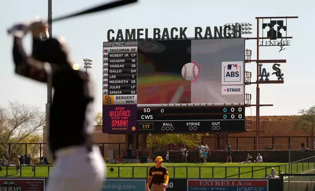 FILE - The Automated Ball-Strike System plays on the scoreboard after a pitch call was challenged during the first inning of a spring training baseball game between the Chicago White Sox and the San Diego Padres, Feb. 26, 2025, in Phoenix. (AP Photo/Carolyn Kaster, File)