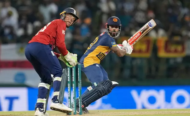 Sri Lanka's Kusal Mendis plays a shot during the third T20 cricket match between England and Sri Lanka in Pallekele, Sri Lanka, Tuesday, Feb, 3. 2026. (AP Photo/Eranga Jayawardena)