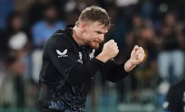New Zealand's Glenn Phillips celebrates the wicket of Sri Lanka's Dunith Wellalage during the T20 World Cup cricket match between Sri Lanka and New Zealand in Colombo, Sri Lanka, Wednesday, Feb. 25, 2026. (AP Photo/Eranga Jayawardena)
